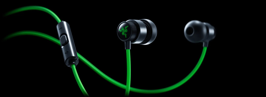 Wireless earbuds with green cable, featuring control button, black earpieces, and the Razer logo on the central earphone.